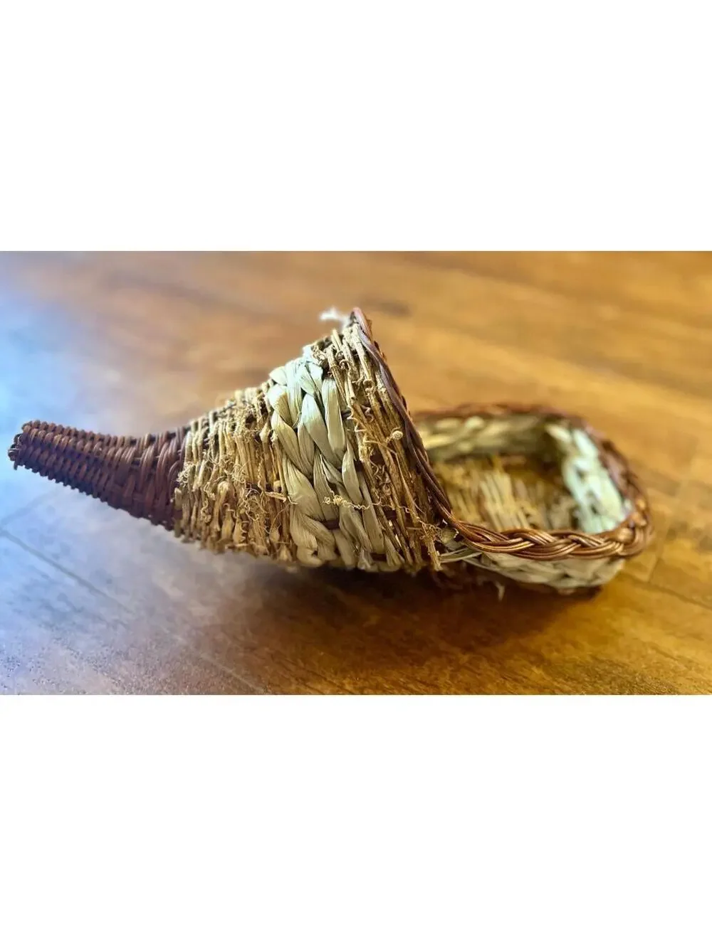 woven wicker cornucopia, also known as a 